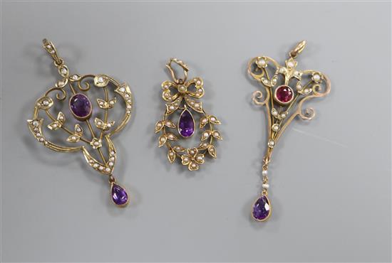 Three assorted Edwardian yellow metal and gem set drop pendants, including amethyst, two stamped 9ct, largest 49mm.